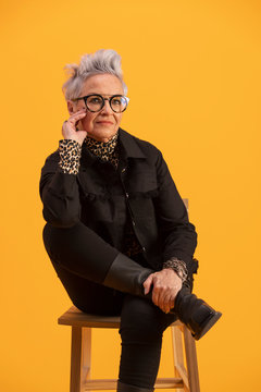 Portrait Of Confident Stylish Senior Woman With Short Gray Hair