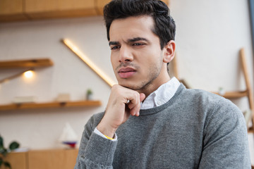 Portrait of thoughtful businessman in office