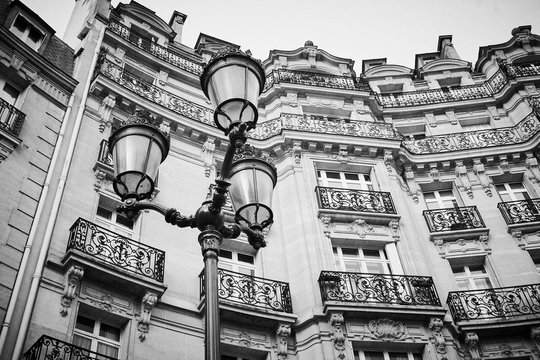 Parisian building with lamp in front Haussmann architecture low angle, France Europe