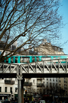 vertical image of the metro bridge of paris, tourist city