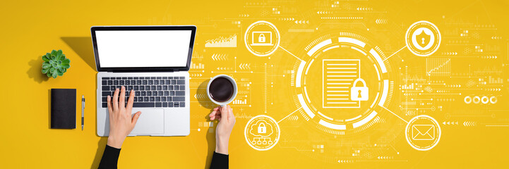 Data protection concept with person using a laptop computer