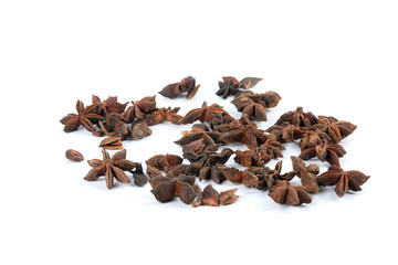 Star anise spice fruits and seeds isolated on white background
