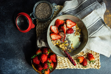 Healthy breakfast concept with oatmeal and strawberry