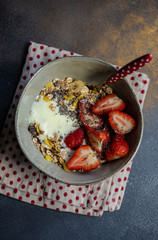 Healthy breakfast concept with oatmeal and strawberry