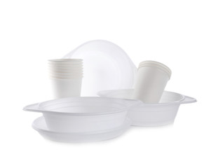 Set of disposable plastic dishware isolated on white