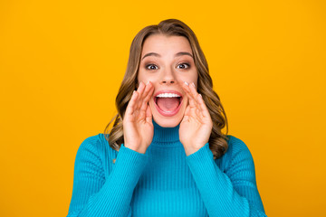 Closeup photo of attractive funny curly lady arms near mouth chatterbox person yelling novelty information people crowd wear casual blue warm turtleneck isolated yellow color background