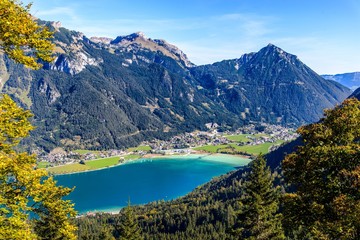 Fototapeta na wymiar View on Achensee - Achen Lake, with blue sky, alps mountains. Pertisau. Tyrol, Tirol. Austria