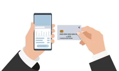 Fotobehang Businessman hand holding smartphone with online banking mobile app and credit card. Buy payment process and bank account balance vector illustration © Azat Valeev