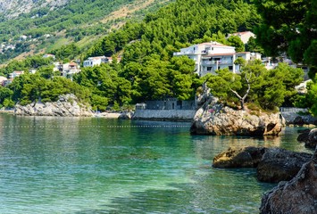 Fototapeta na wymiar beautiful famous Brela Kamen Rock - symbol of Brela, near Punta Rata beach, small Podrace beach. Makarska Riviera, Croatia