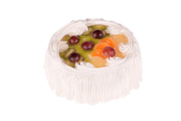 Fruit cake with air cream on white background