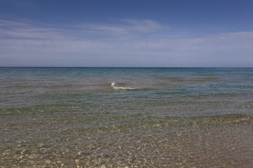 Caspian Sea. Clear sea water. The sea is blue with small waves. selective focus
