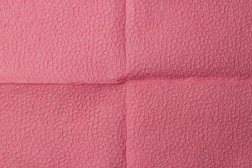 Fototapeta premium Background of an pink napkin in the form of an open book