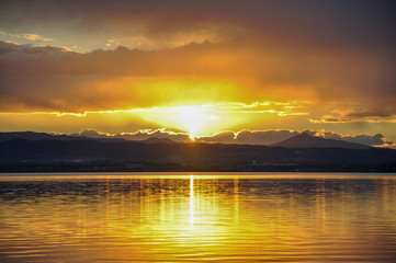 Sunset at pier in the Natural Park of the Albufera in Valencia