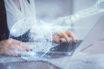 Multi exposure of woman hands working on computer and data theme hologram drawing. Tech concept.