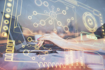 Multi exposure of woman hands working on computer and data theme hologram drawing. Tech concept.