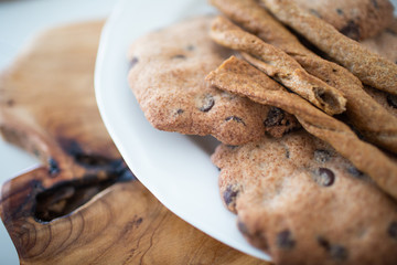 Healthy gluten free cookies with chocolate on a wooden background