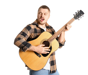 Young male singer with guitar on white background