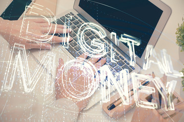 Double exposure of woman hands typing on computer and crypto market theme hologram drawing. Blockchain concept.