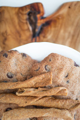 Healthy gluten free cookies with chocolate on a wooden background