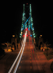 View From Stanley Park To The Lion's Gate Bridge In Vancouver At Night