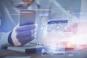 Double exposure of man hands holding a credit card and data theme drawing. E-commerce and technology concept.