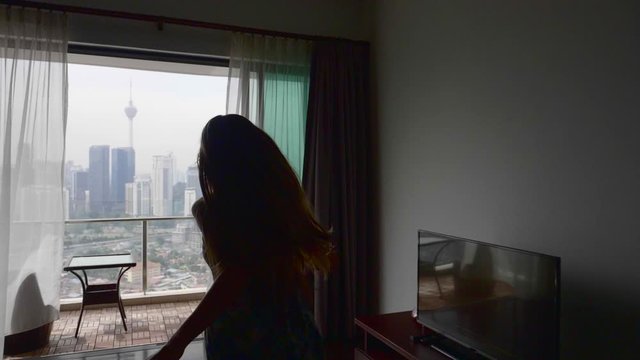 Happy Woman in Apartment