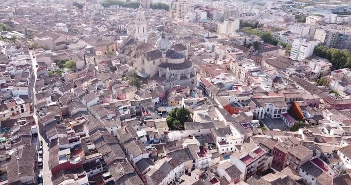 Aerial panoramic view of Xativa cityscape with Collegiate Basilica of Santa Maria, Spain