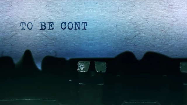 To be continued Word closeup Being Typing and Centered on a Sheet of paper on old vintage Typewriter mechanical 4k Footage Background Animation.