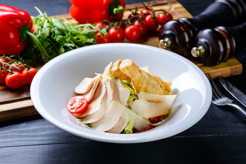 fresh salad of vegetables and chicken fillet