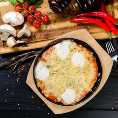 homemade pizza in a pan