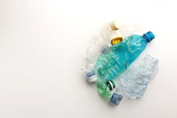 Heap of plastic garbage isolated on white background