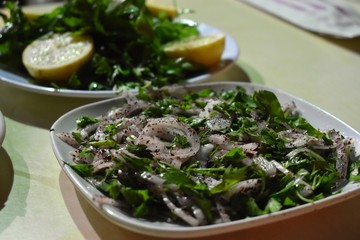 Onion salad with parsley and sumac is traditional side dish for kebab dish