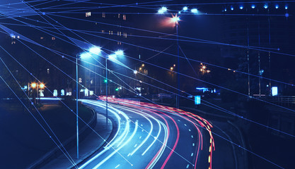 Night cityscape and network connection lines. Cloud technology