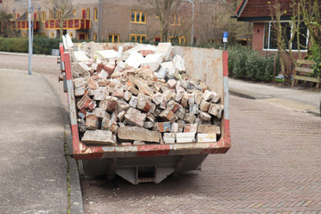 Loaded garbage dumpster