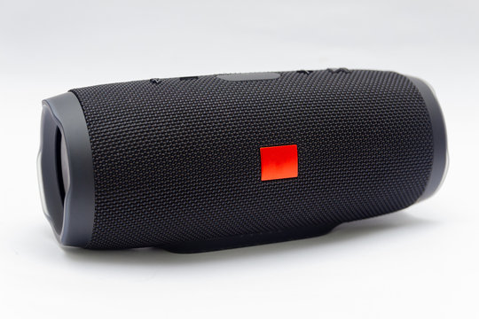 Black portable bluetooth speaker, with all-weather protection.