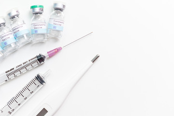 Hypodermic needle and vaccine for Covid-19 On a white background