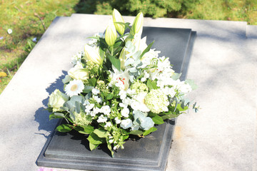 Funeral flowers on a tomb