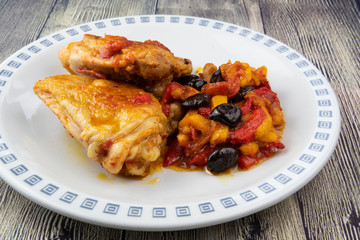 Chicken with peppers, olives and cherry tomatoes