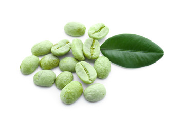 Green coffee beans on white background