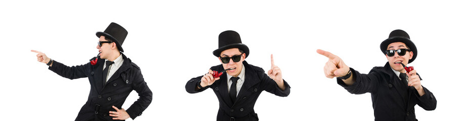 Young detective in black coat holding magnifying glass isolated