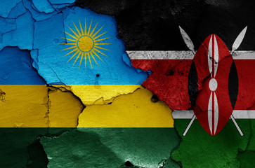 flags of Rwanda and Kenya painted on cracked wall