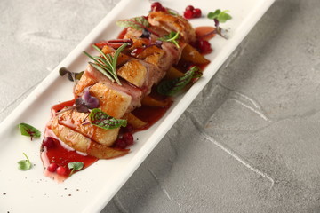 Juicy duck breast steaks with microgreen. restaurant dish. closeup