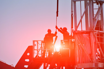 The oil workers in the job
