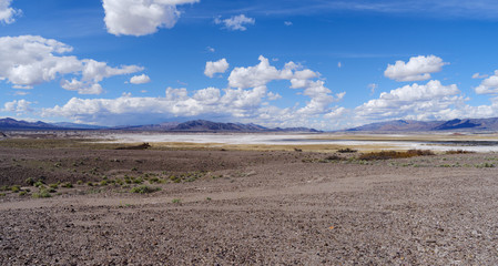 Fototapeta na wymiar Panorama looking north of Grimshaw Lake near Tecopa and south of Death Valley as seen from Old Spanish Trail highway.