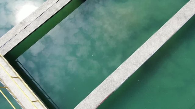 Aerial top view recirculation solid contact clarifier sedimentation tank Water treatment plant facility
