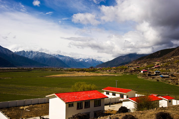 countryside  landscape with blue sky and clouds, Tibet, China 