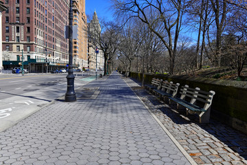 As the COVID-19 coronavirus pandemic broadens in scope, Manhattan streets and sidewalks become eerily empty