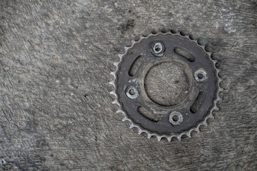 Motorcycle gear that is covered in oil and used for a long time