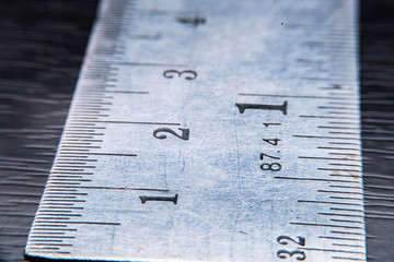 Numbers on the metal ruler