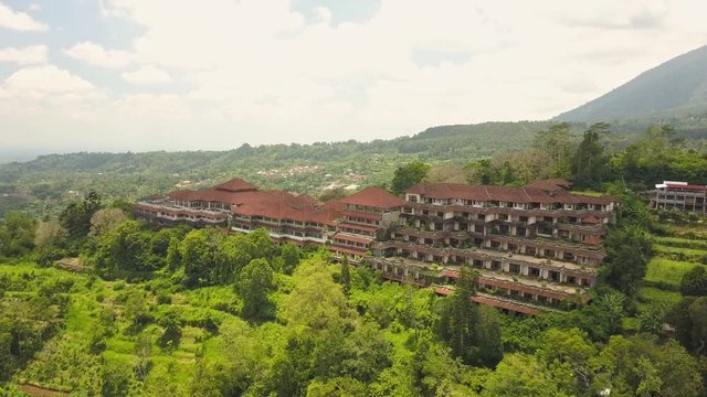 Aerial drone video of abandoned hotel in Bedugul, Bali island.